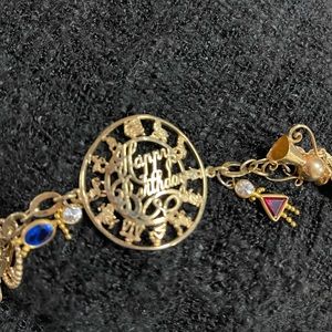 14k GOLD UNIQUE HEAVY GOLD CHARM BRACELET!